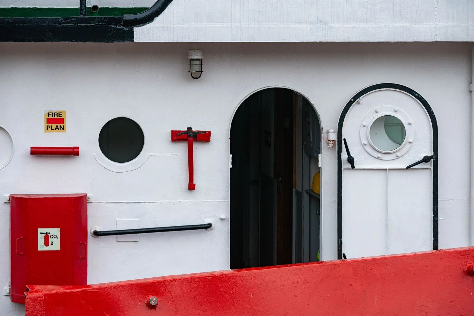 Marine ventilation louver and access hatch on a ship's superstructure